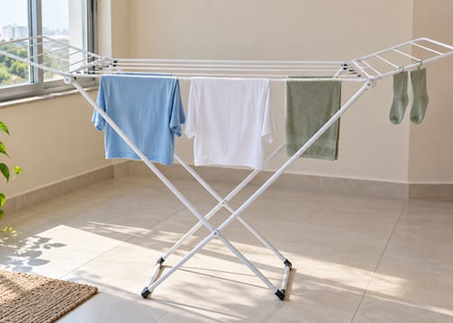 Como estender roupa no varal de chão